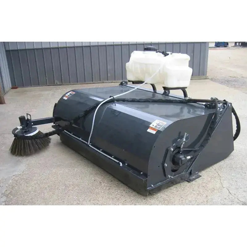 Versatile Skid Steer Pick-up Brooms by Haugen Attachments, offering powerful sweeping capabilities and efficient cleaning for various applications. Haugen Attachments