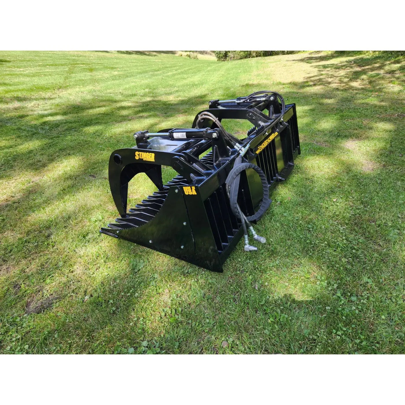 Durable Skid Steer Attachment - Open Sides Rock Grapple Bucket (ROG) by HeavyEquipTech 1