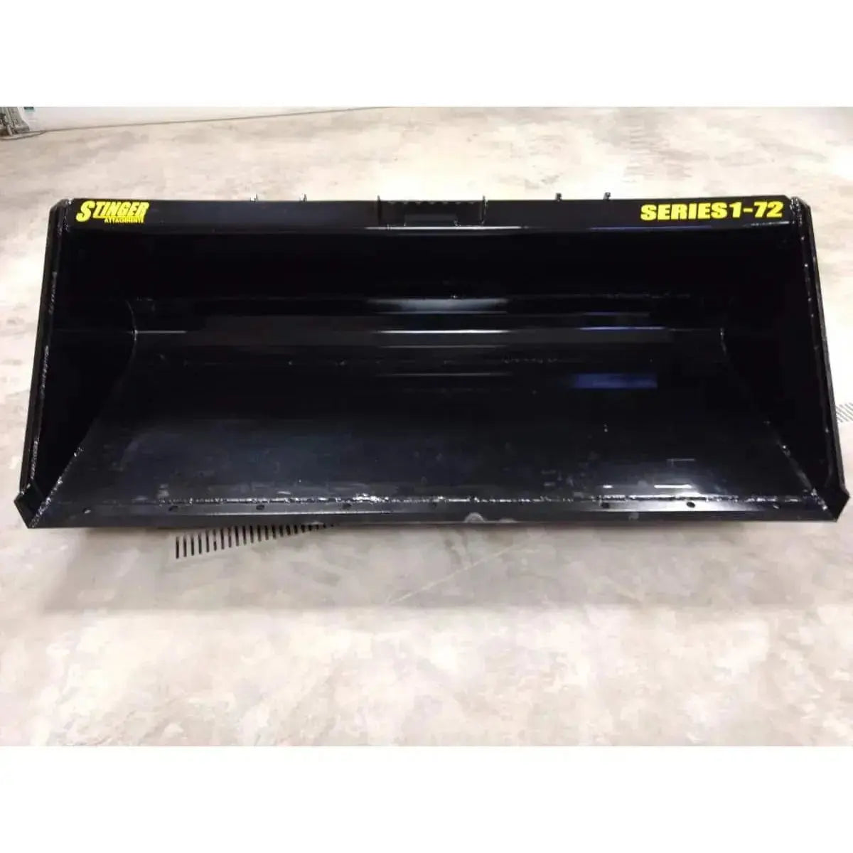 Series 1 material bucket attachment for skid steer loaders, built for rugged use. Stinger Attachments Stinger Attachments