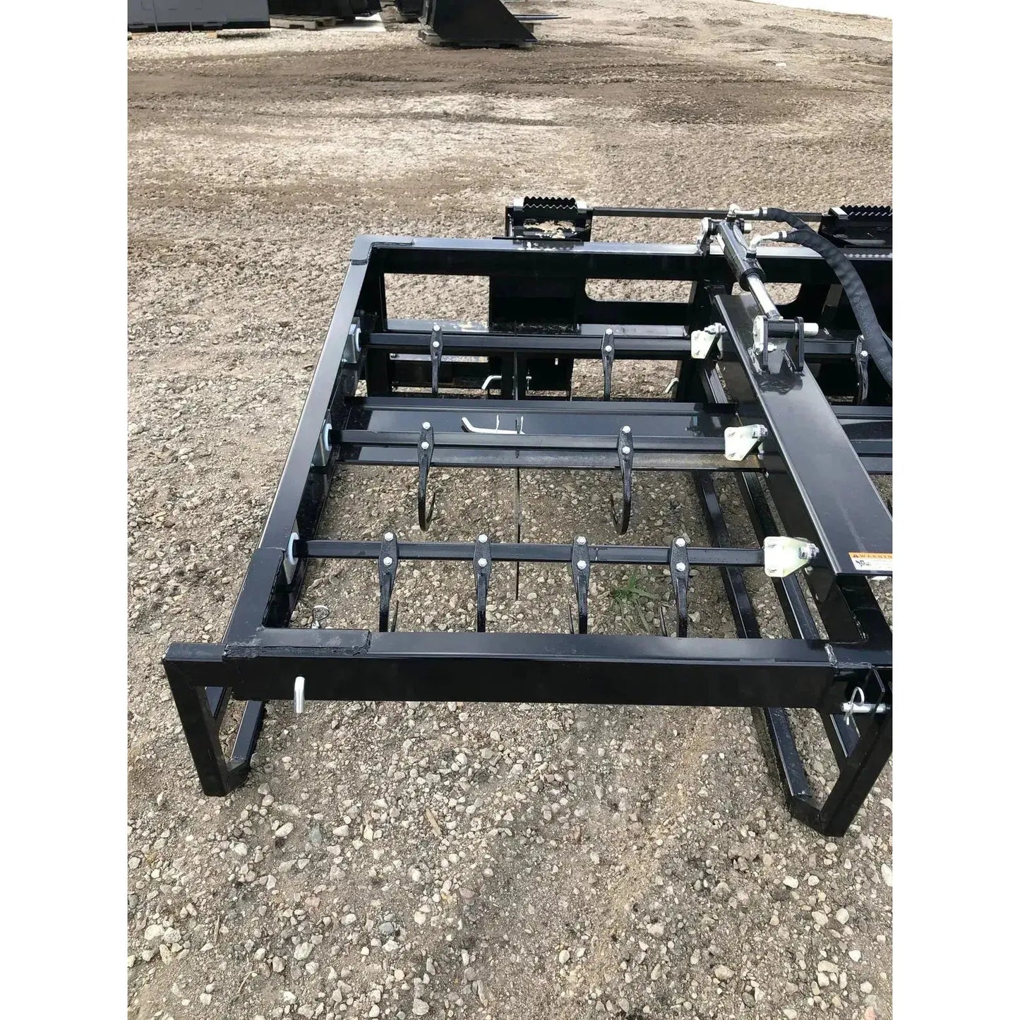 Explore the versatility of Top Dog Attachments' Bale Accumulator Grapple, designed for reliable bale stacking. Top Dog Attachments