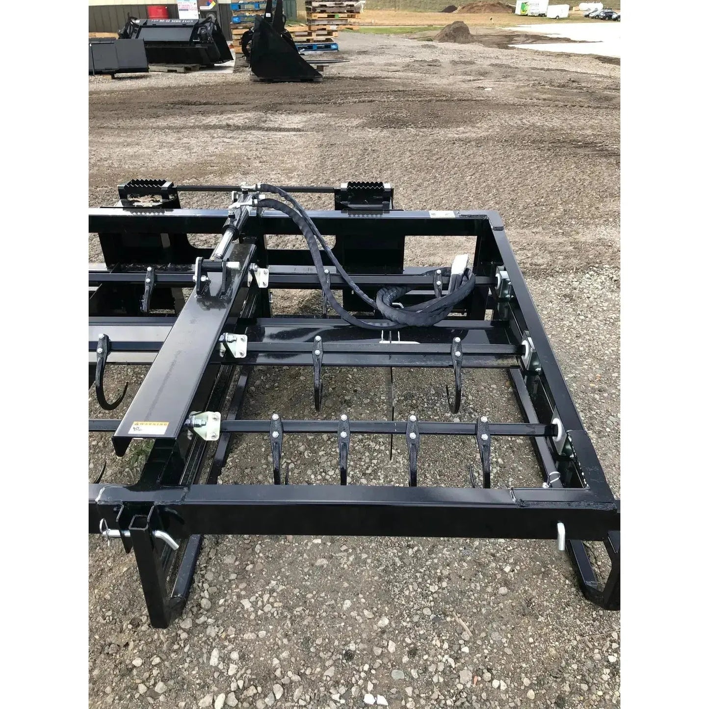 Witness the power and efficiency of Top Dog Attachments' 6-Pack Bale Accumulator Grapple for seamless bale handling. Top Dog Attachments Top Dog Attachments