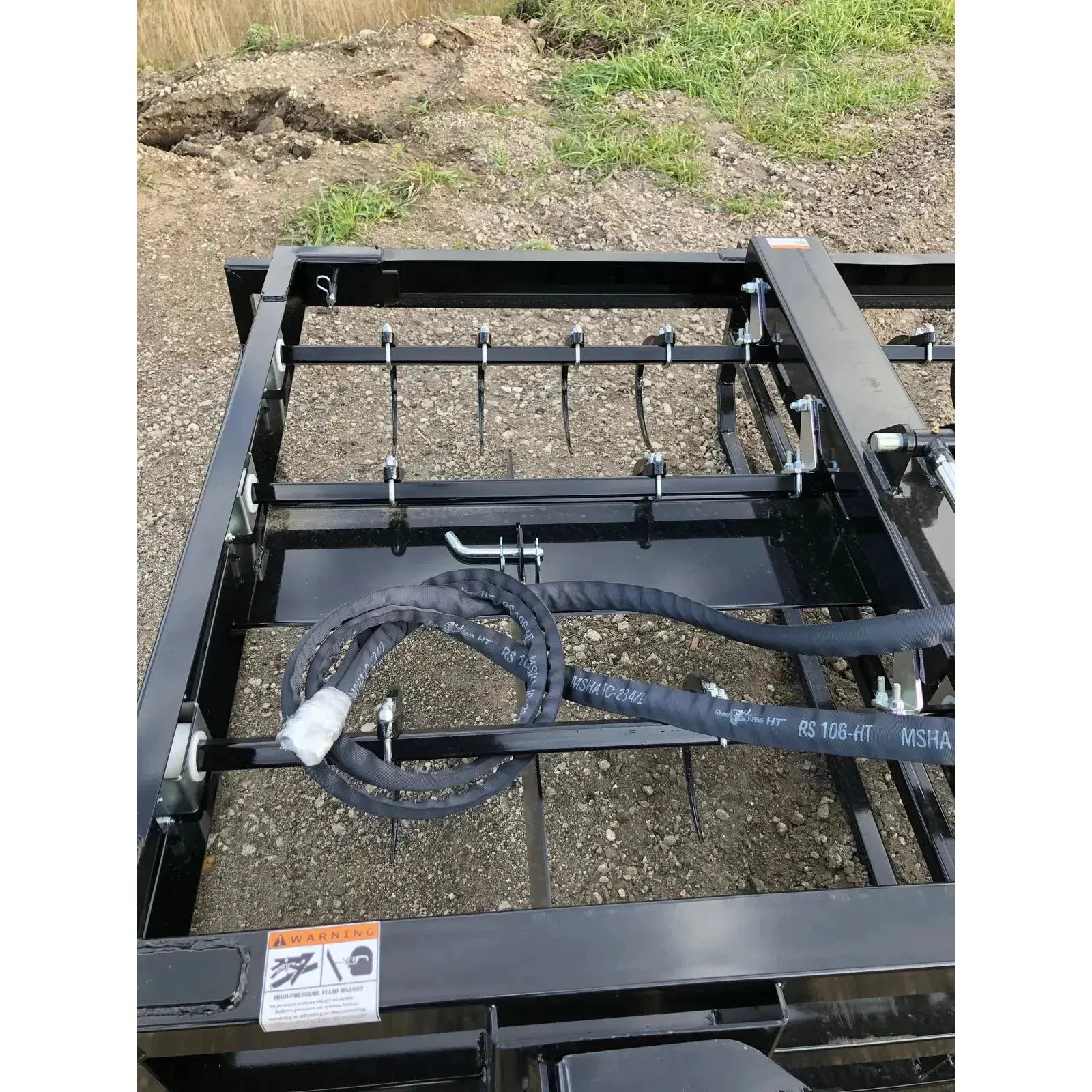 Optimize your bale-handling operations with Top Dog Attachments' specialized 6-Pack Bale Accumulator Grapple. Top Dog Attachments