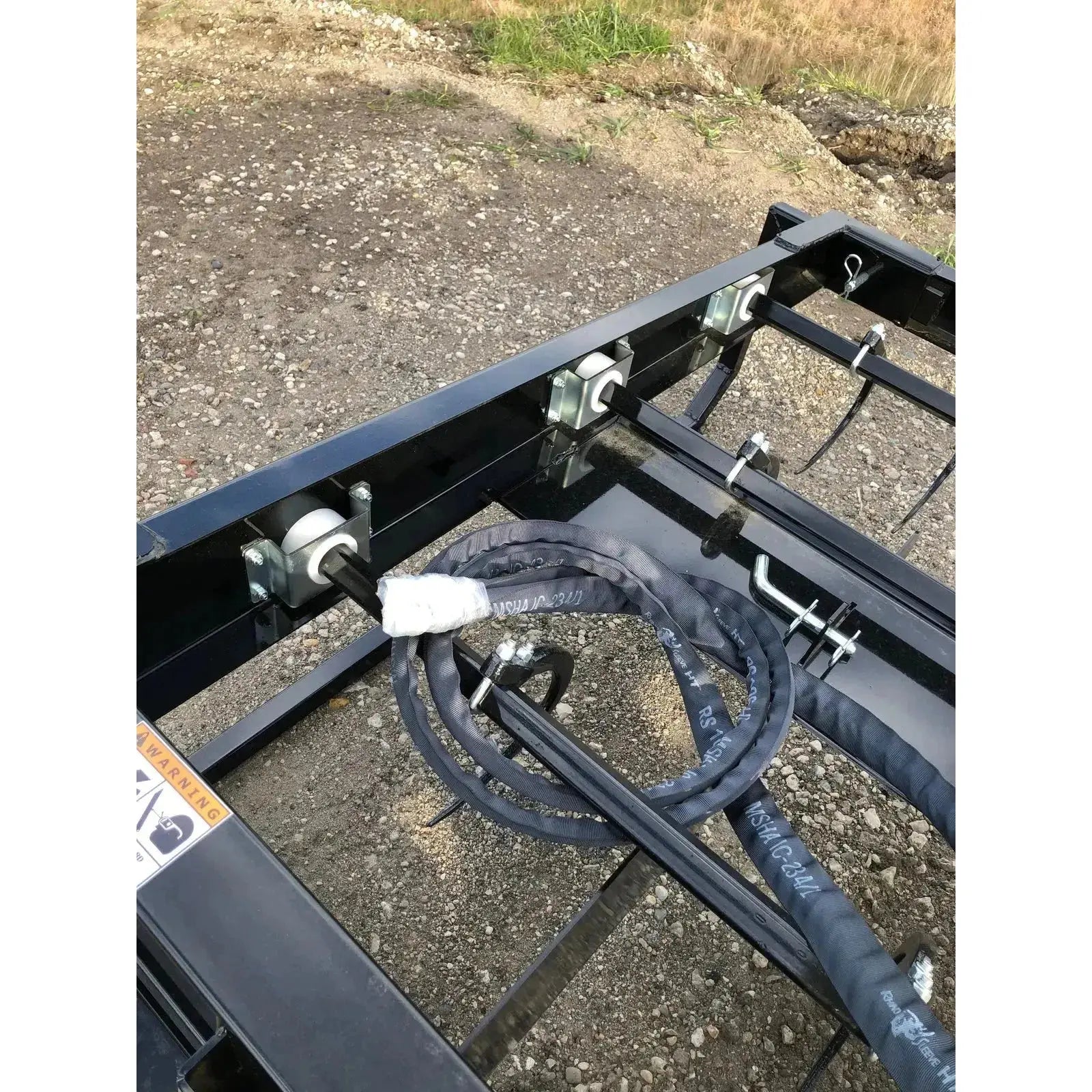 Top Dog Attachments' 6-Pack Bale Accumulator Grapple: Your solution for quick and precise bale accumulation. Top Dog Attachments Top Dog Attachments