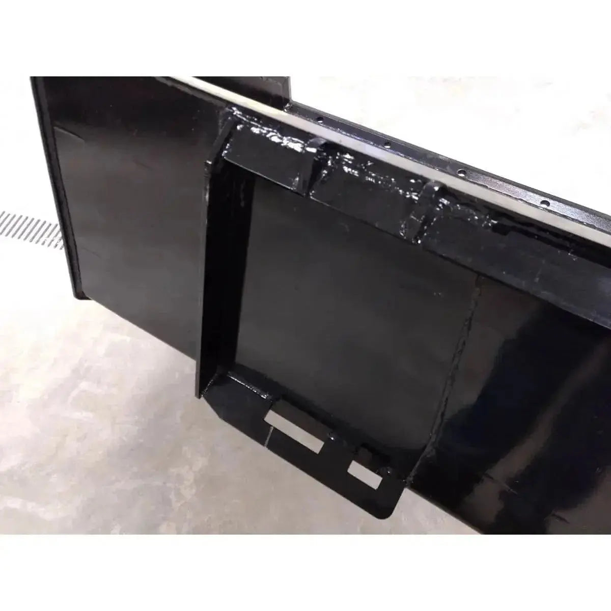 Heavy-duty construction meets versatility in this Series 1 skid steer material bucket Stinger Attachments Stinger Attachments