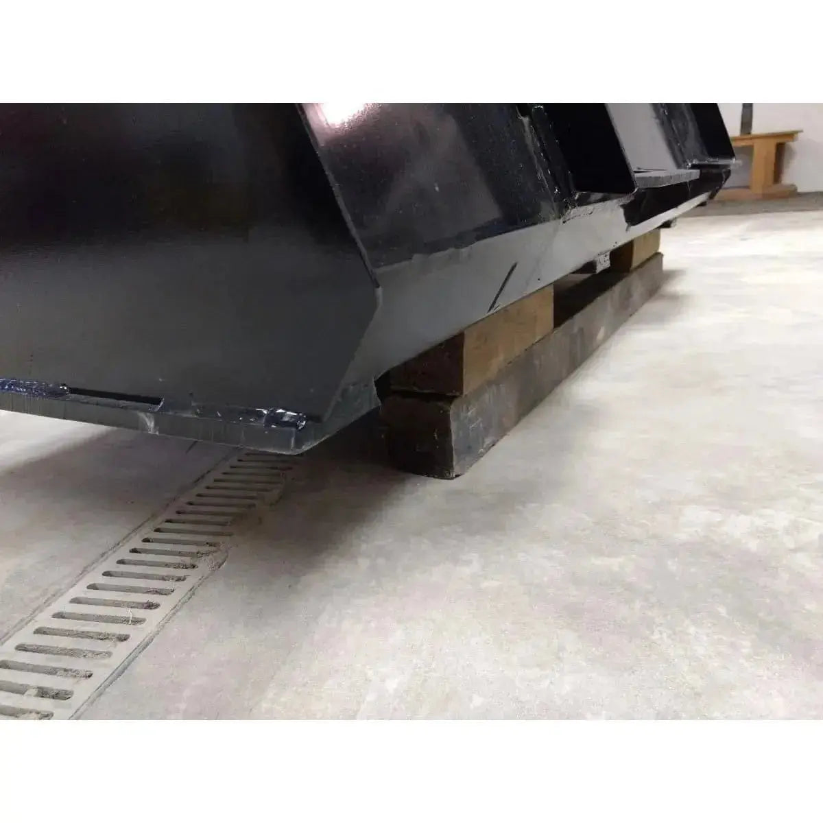 Series 1 bucket attachment for skid steers, designed for strength and durability Stinger Attachments Stinger Attachments