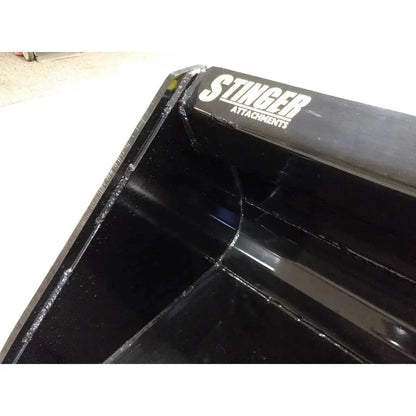Reliable Series 1 material bucket crafted for skid steer loaders, delivering power. Stinger Attachments Stinger Attachments