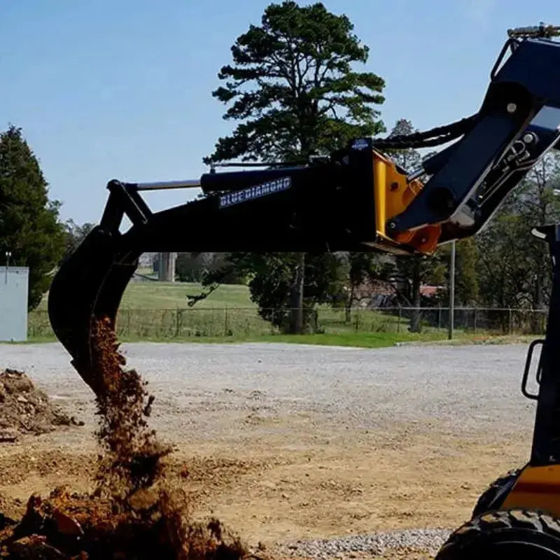 Efficient digging and excavation with Blue Diamond's Backhoe Attachment, engineered for reliability and durability. Blue Diamond
