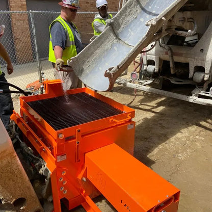 Efficient concrete pumping with the Skid Steer Concrete Pump by EZG Manufacturing.