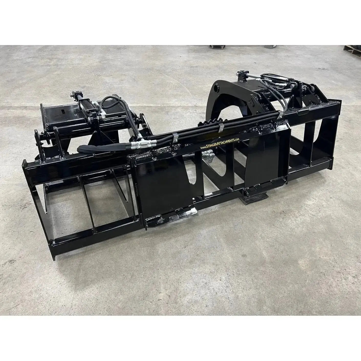 Durable and Versatile RTG Grapple - HeavyEquipTech's Superior Land Management Stinger Attachments Stinger Attachments