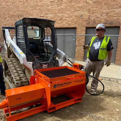 Explore the versatility of concrete placement with EZG Manufacturing's Skid Steer Concrete Pump.