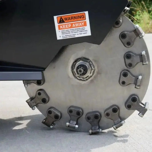 High-performance stump grinder with swing arm, designed for precision and ease in grinding tree stumps, ensuring a clean and smooth finish. Blue Diamond Blue Diamond