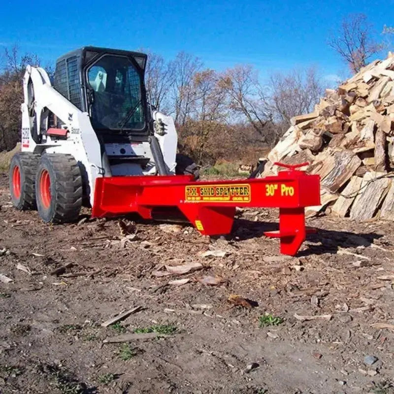 TM Pro 2 Skid Steer Log Splitter at work, showcasing user-friendly features like the interchangeable single and 4-way wedges. TM Manufacturing TM Manufacturing