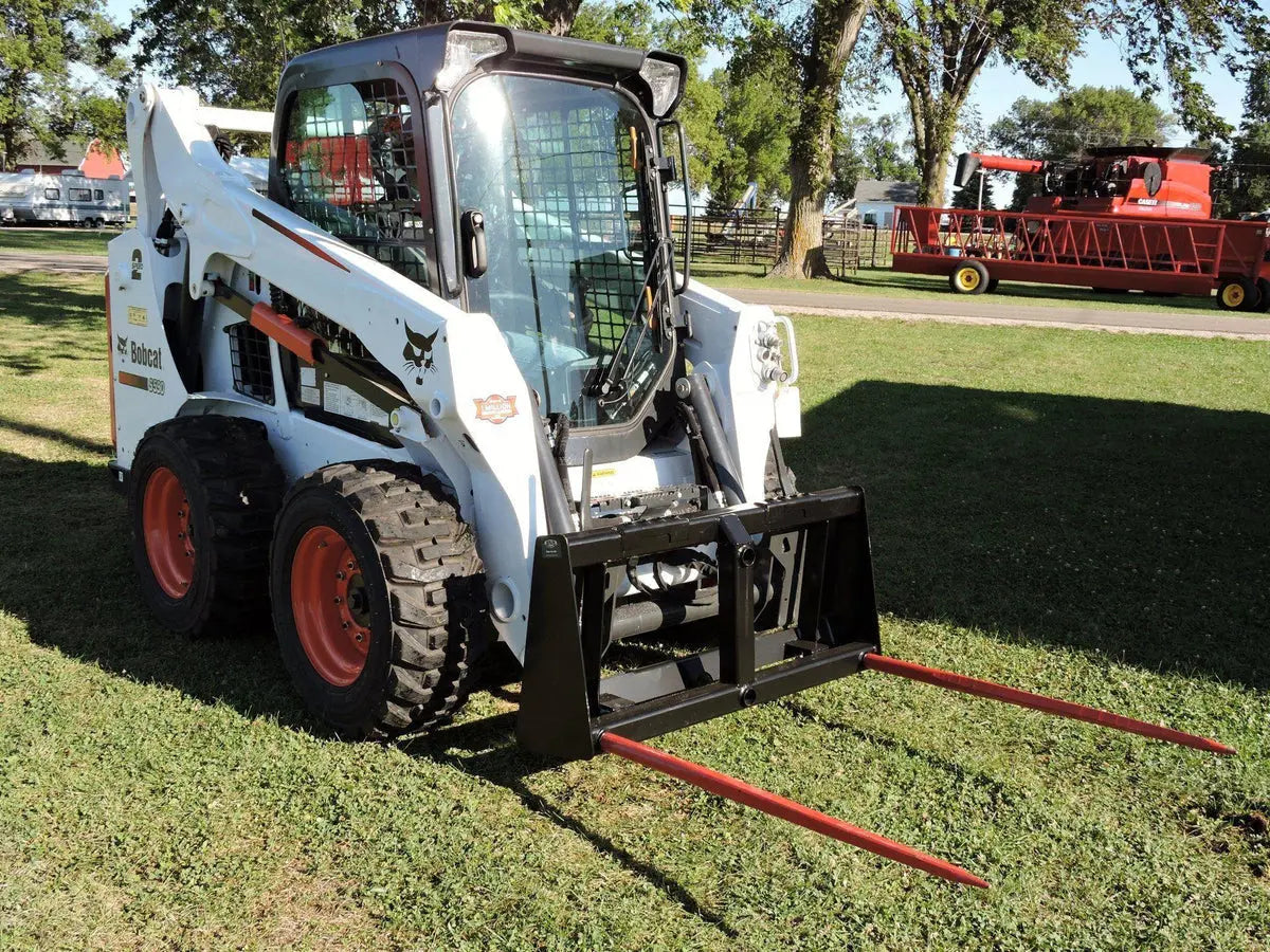 Berlon Industries' Bale Spear Carriages with Tines: A versatile solution for efficient bale handling with both Skid Steers and Tractors. 11