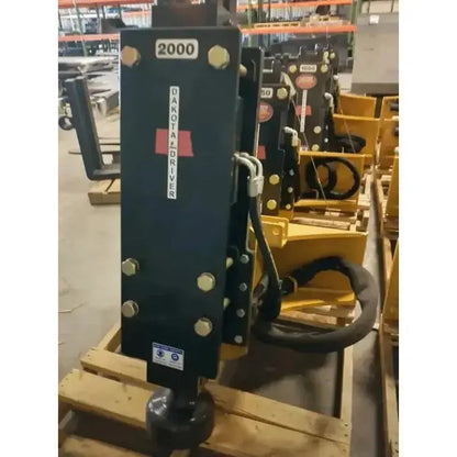 Efficient post driving with Haugen Attachments' Dakota Post Driver for Skid Steers. Haugen Attachments