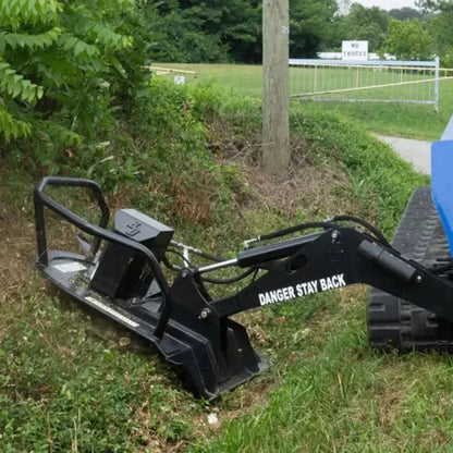Effortlessly clear overgrowth with Blue Diamond's Swing Arm Brush Cutter designed for skid steers Blue Diamond
