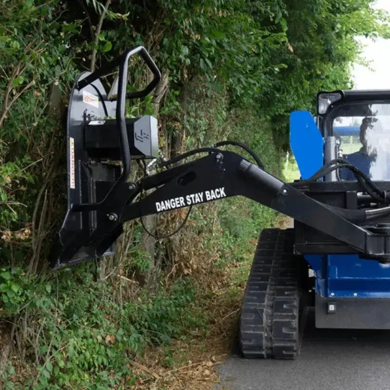 Experience the versatility of Blue Diamond's Skid Steer Swing Arm Brush Cutter, engineered for precise cutting in various terrains. Blue Diamond Blue Diamond