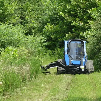 Navigate through dense vegetation with ease using Blue Diamond's Swing Arm Brush Cutter, a reliable attachment for skid steers. Blue Diamond